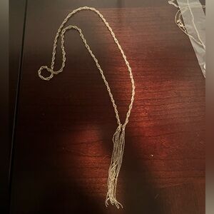 Boutique gold tassel necklace